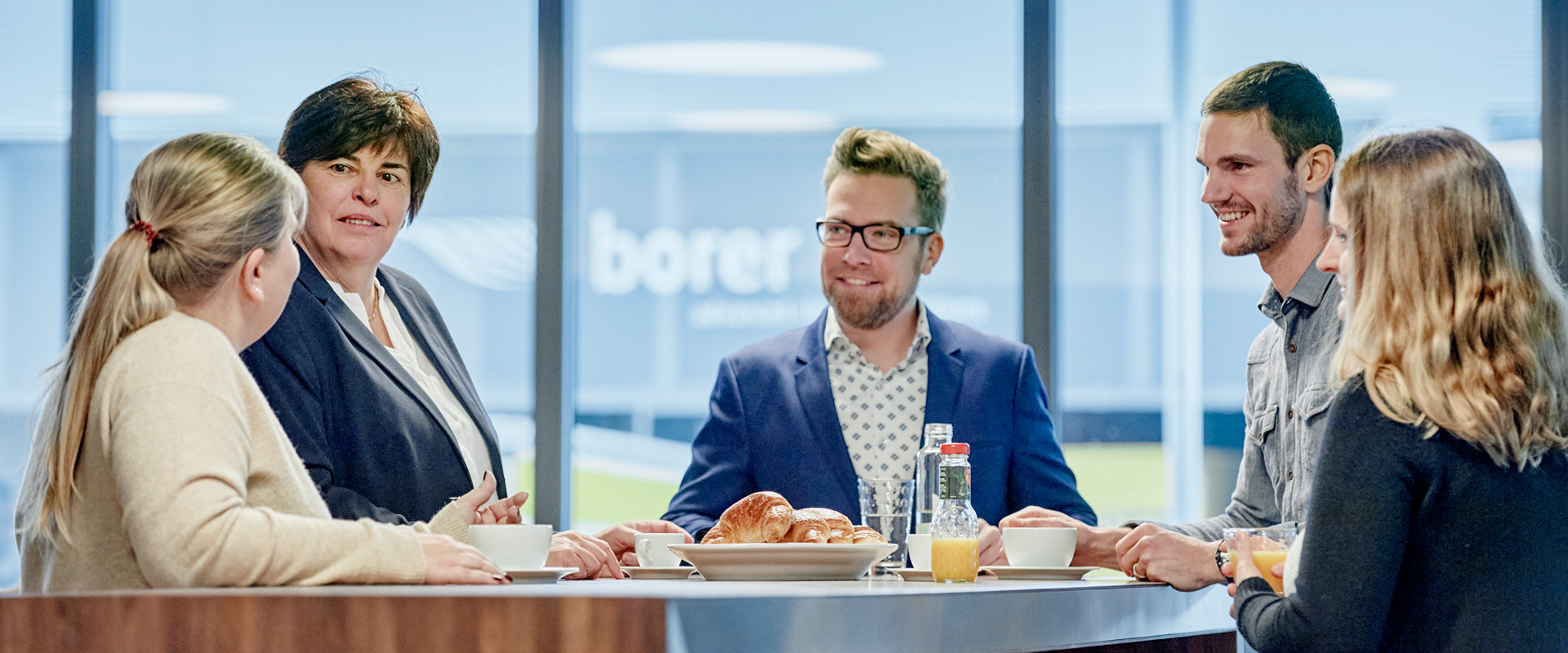 Employees take a coffee break together